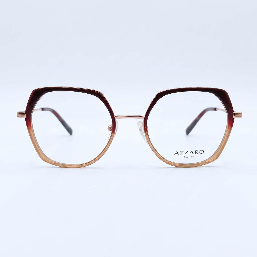 Round-gradient eyeglasses with dark brown to peach rims, on a white background; 'AZZARO PARIS' is visible on the lens.