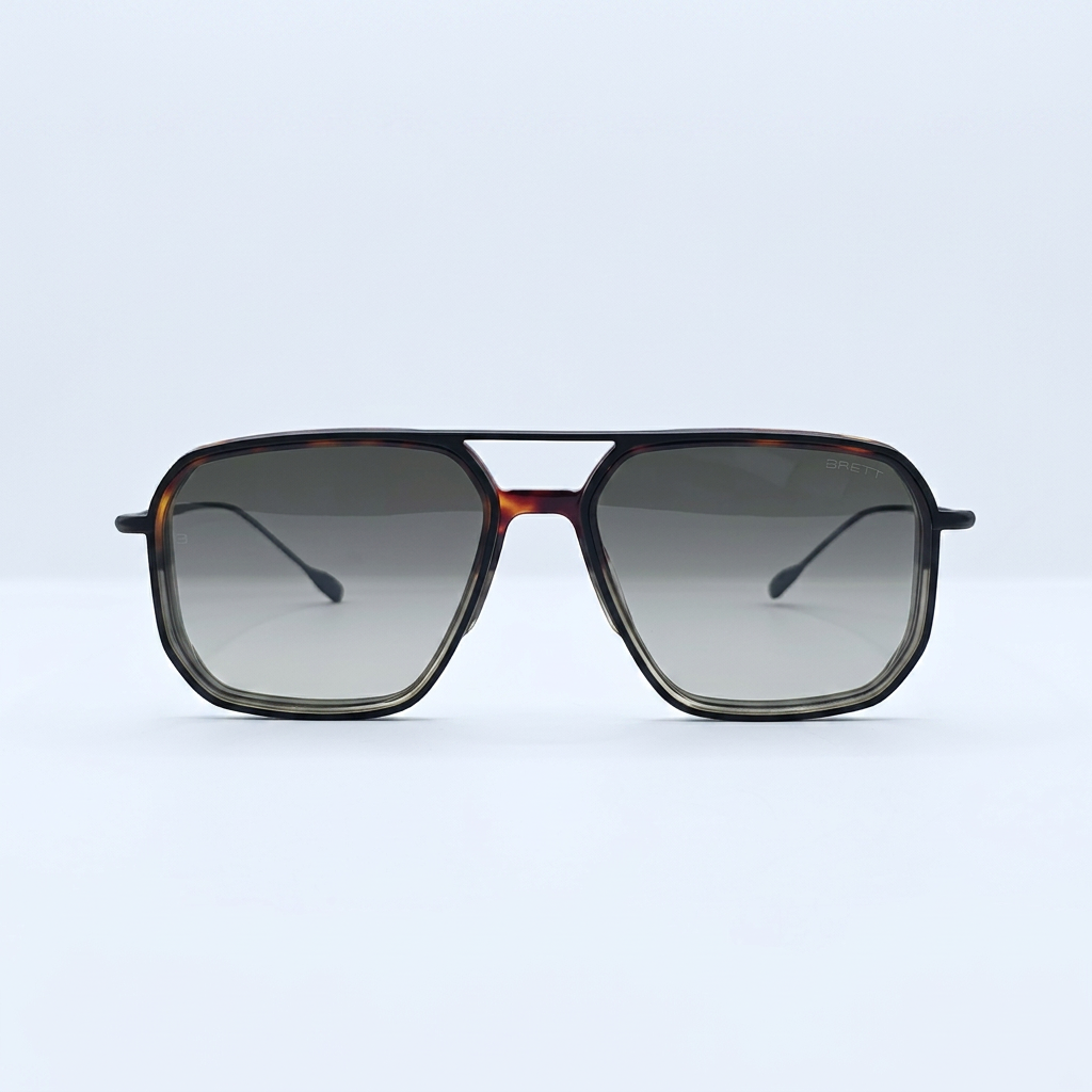 Tortoiseshell aviator sunglasses with gray gradient lenses on a white surface.
